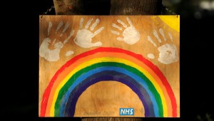 FARNHAM, ENGLAND - MAY 05: A homemade rainbow sign shows support for the NHS outside Dares Farm on May 05, 2020 in Farnham, England. The country continued quarantine measures intended to curb the spread of Covid-19, but the infection rate is falling, and government officials are discussing the terms under which it would ease the lockdown. (Photo by Alex Burstow/Getty Images)