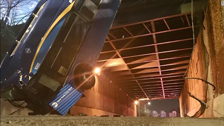 Bus hangs from overpass in New York