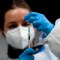 A health worker prepares a Pfizer-BioNTech COVID-19 vaccine during a vaccination campaign of members of the Emergency Medical Services of Madrid (SUMMA) in Madrid on January 12, 2021. - Spain's regions are stepping up virus restrictions but the government remains adamant it would not impose a lockdown despite an expected post-Christmas surge in infections. (Photo by OSCAR DEL POZO / AFP) (Photo by OSCAR DEL POZO/AFP via Getty Images)