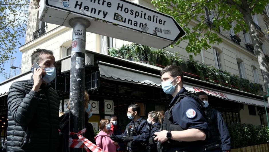 French police cordon off the area near the Henry Dunant private hospital where one person was shot dead and one injured in a shooting outside the instituion owned by the Red Cross in Paris' upmarket 16th district on April 12, 2021. (Photo by Anne-Christine POUJOULAT / AFP) (Photo by ANNE-CHRISTINE POUJOULAT/AFP via Getty Images)