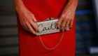 Jenner holds her clutch purse