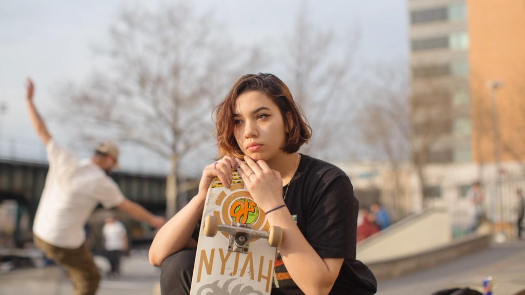 Portraits of women skateboarding