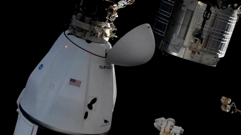 The SpaceX Dragon spacecraft begins to return to Earth