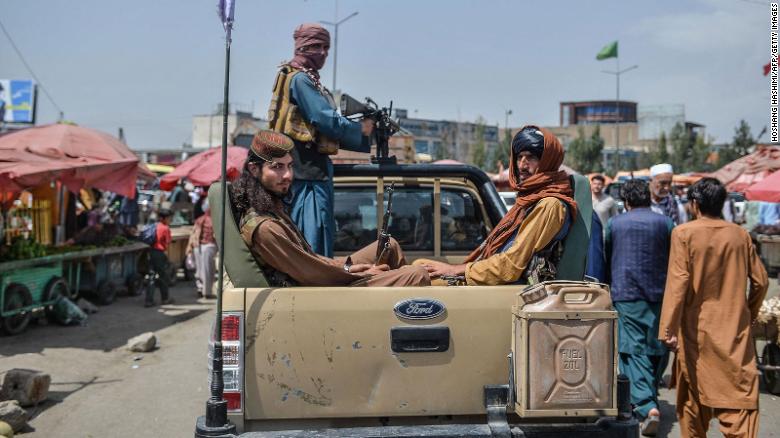 What is the sharia law under which the Taliban rule Afghanistan?