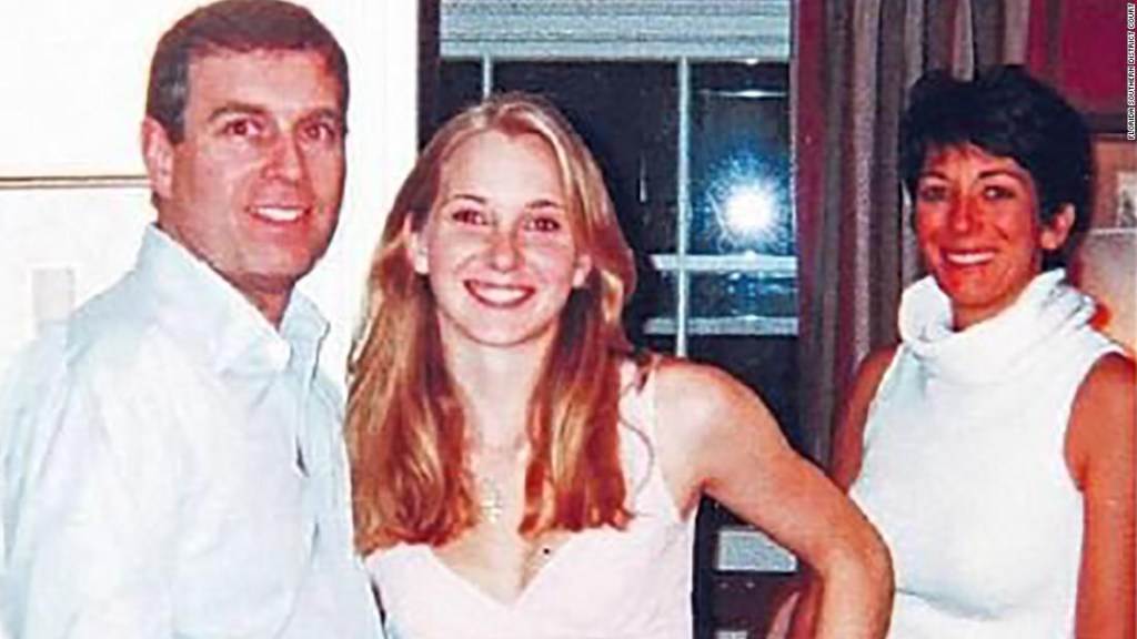 Photograph that appears to show Prince Andrew the Duke of York with Jeffrey Epstein's accuser Virgina Guifre and alleged Madame Ghislaine Maxwell