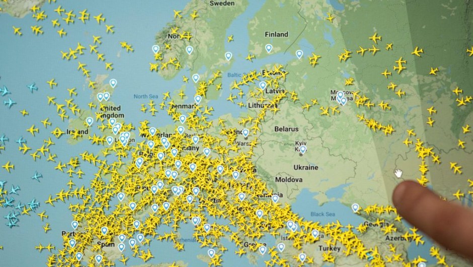 A photo shows a page on the Flightradar 24 website thats shows civilian flights in Europe, on February 24, 2022 in Nantes, western France. - Russian President announced a military operation in Ukraine on February 24, 2022, with explosions heard soon after across the country and its foreign minister warning a "full-scale invasion" was underway. (Photo by LOIC VENANCE / AFP) (Photo by LOIC VENANCE/AFP via Getty Images)