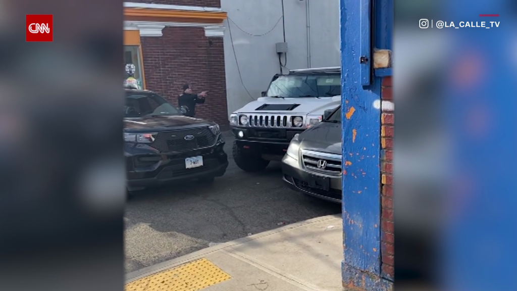 Woman rams several police cars with a Hummer