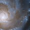 El Hubble espía el corazón de una galaxia en espiral de gran diseño