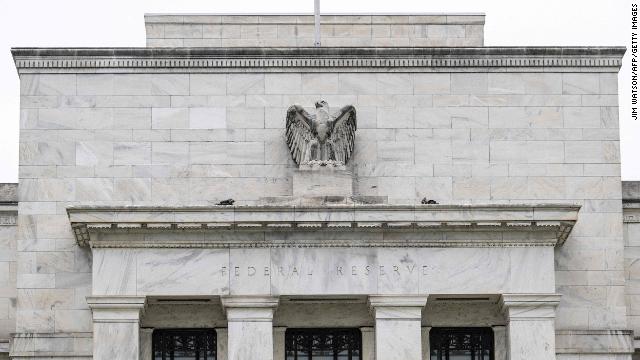   The Fed decides to raise interest rates by half a percentage point