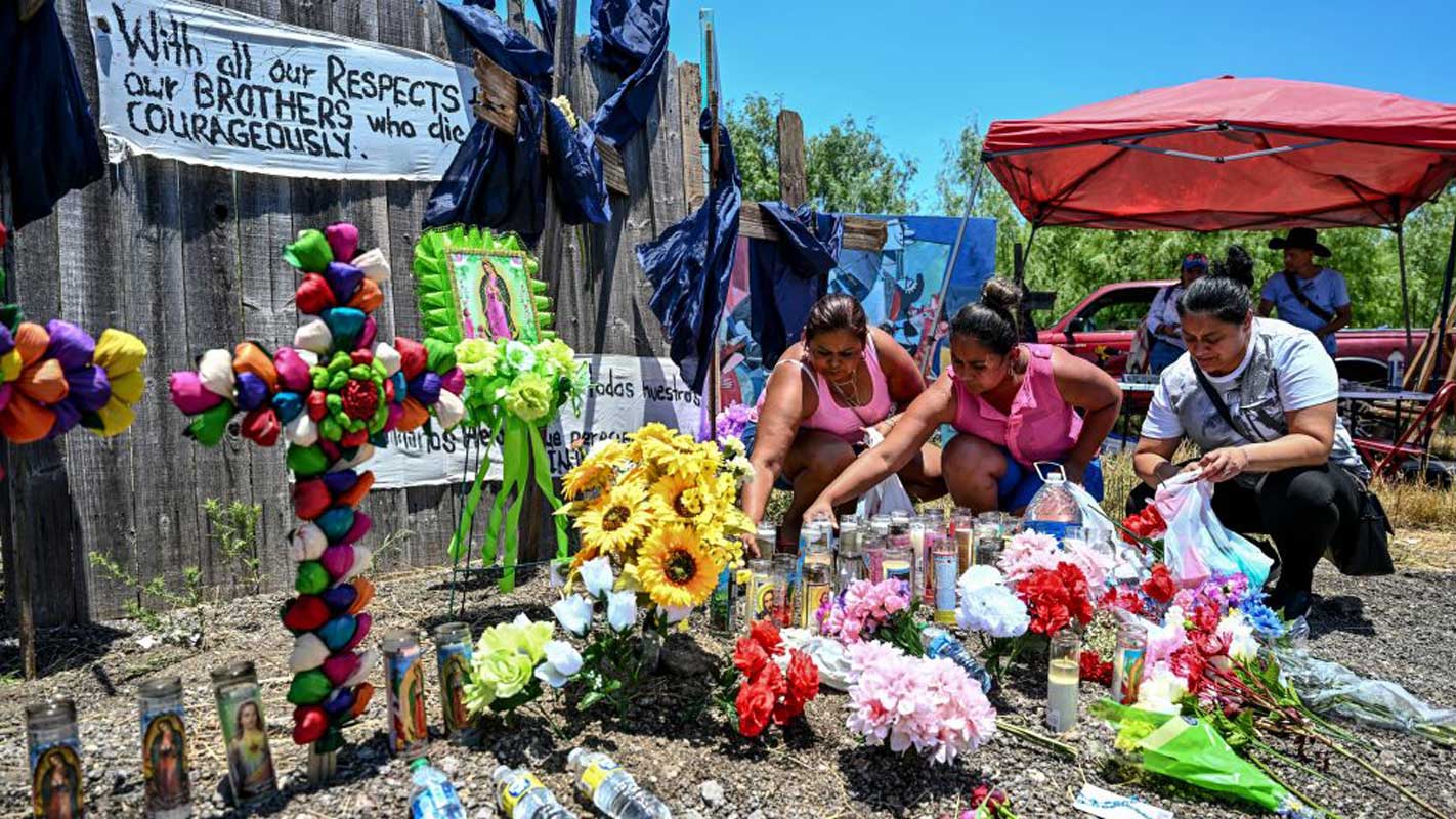 Tribute to dead migrants inside a trailer in San Antonio, Texas