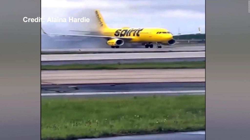 Watch the moment a Spirit flight catches fire after landing