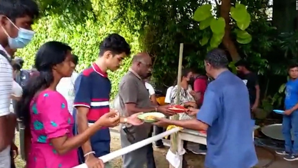 Protesters sing and cook at the Prime Minister's house in Sri Lanka