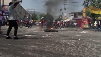 Lucha entre bandas tiene a residentes en Haití sin servicios