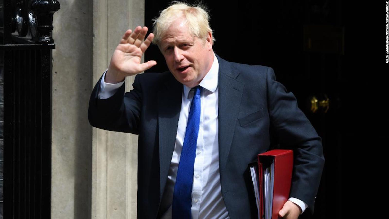 Boris Johnson clings to power after dozens of lawmakers resigned and urge him to leave office