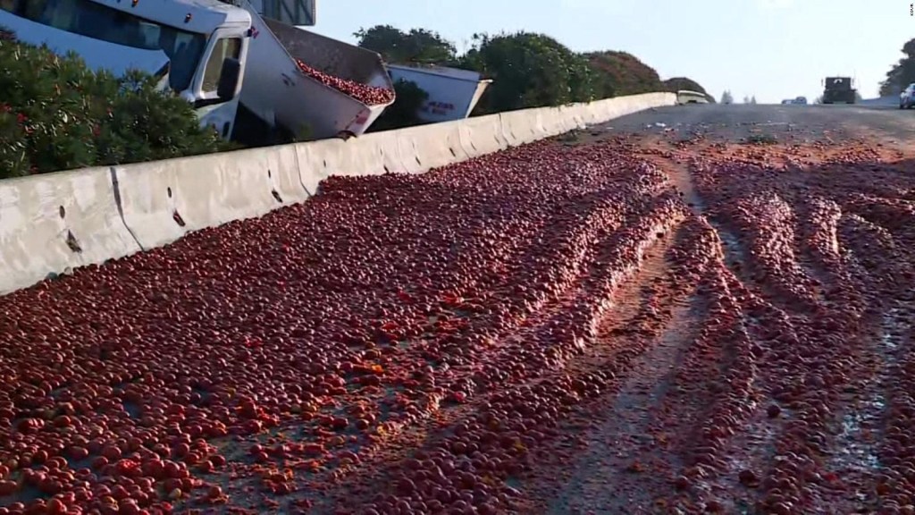 Tomatoes roll on a California highway