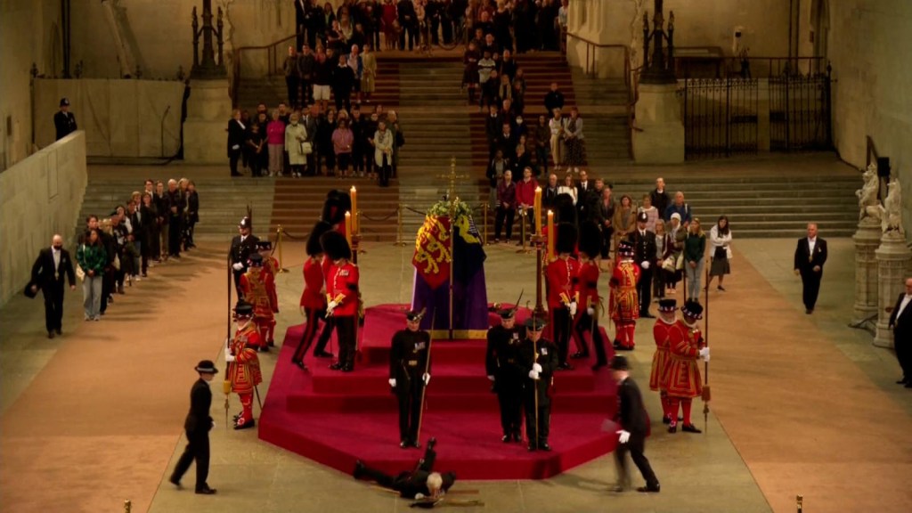 Looks like the guard fainted while guarding the Queen's coffin