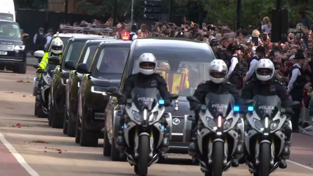 The public bid farewell to Queen Elizabeth II in London by throwing flowers at her coffin