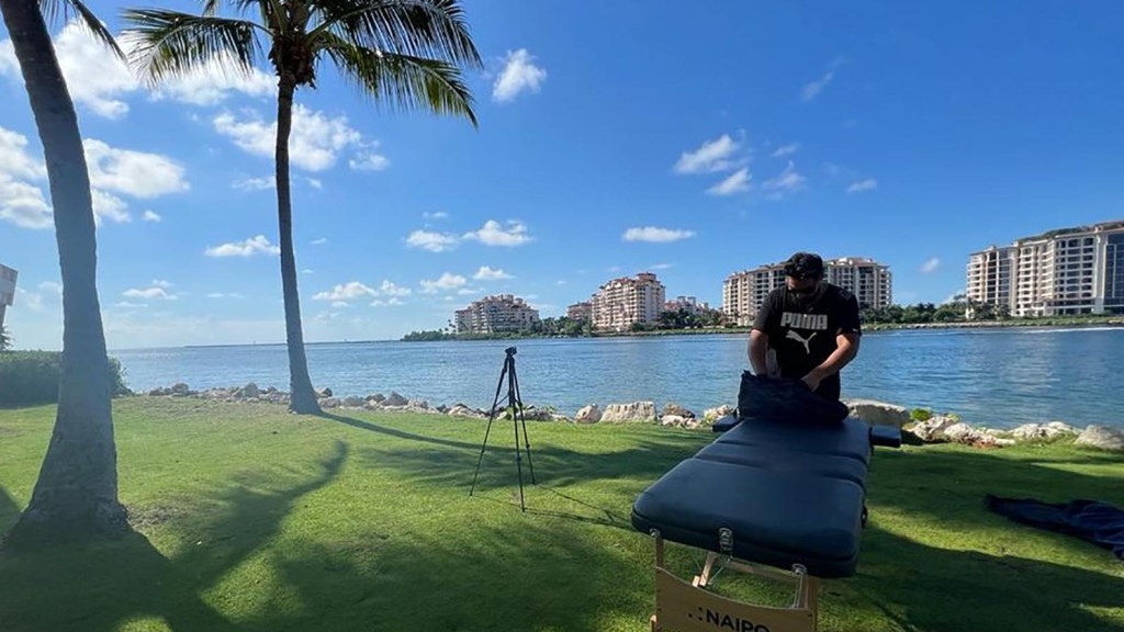 He left Argentina to give free massages in Miami Beach