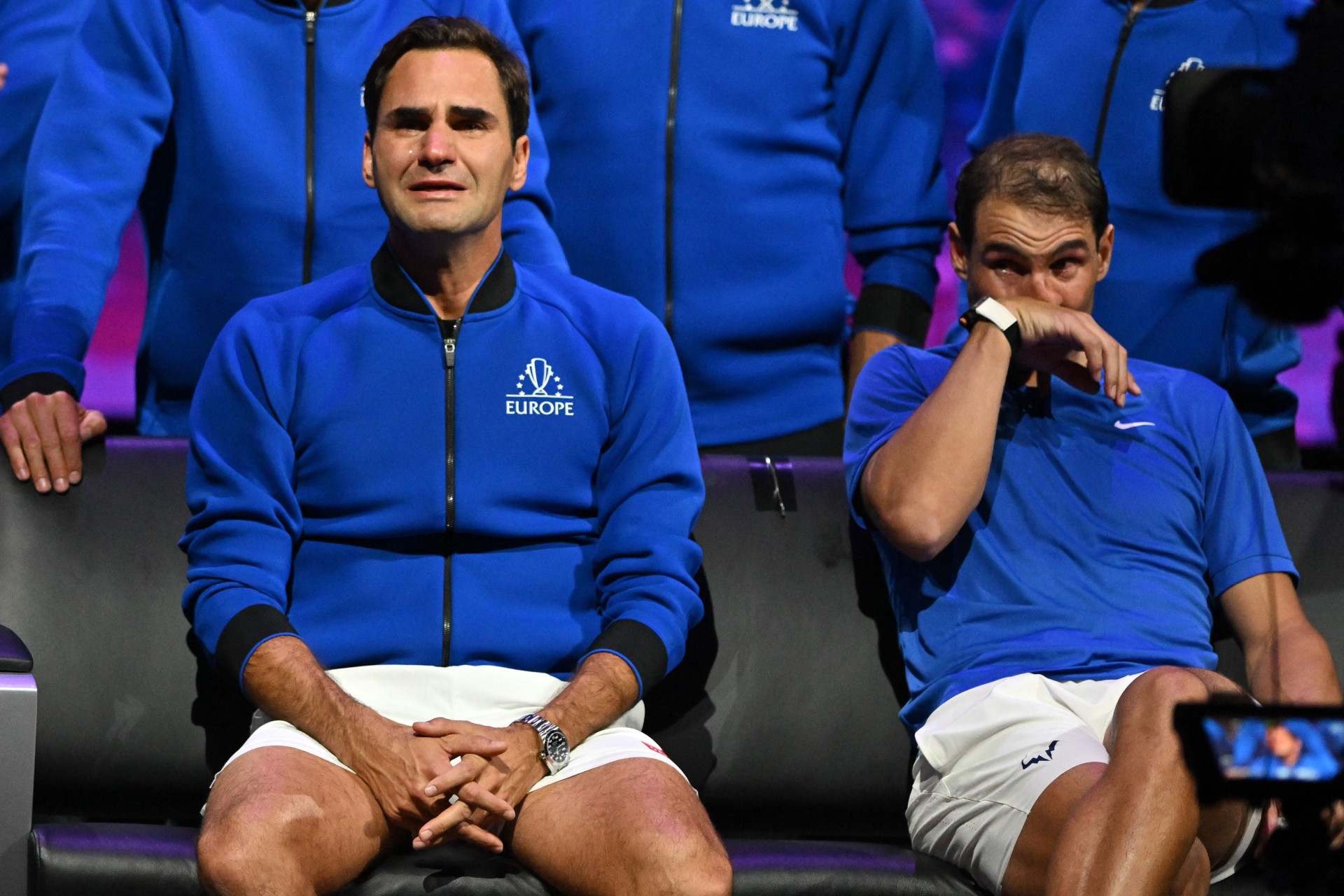 Roger Federer and Rafael Nadal cheer during the Swiss's last professional match at the Laver Cup on September 24, 2022 in London.