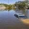 Vehículos y casas sumergidos en el agua en un barrio inundado tras el paso del huracán Ian en Orlando, Florida, el 30 de septiembre de 2022.