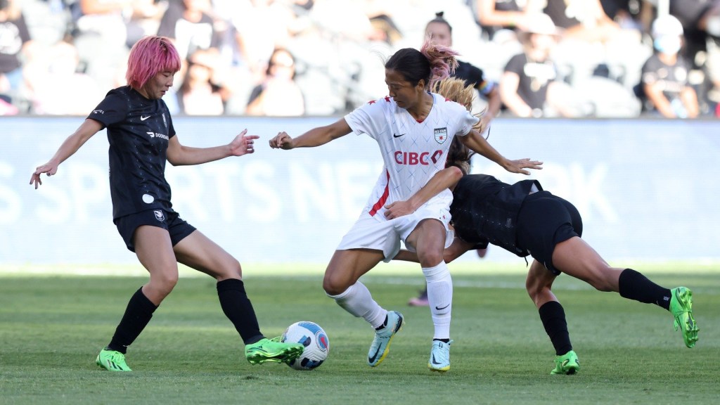 #7 Yuki Nagasato Of The Chicago Red Stars Fights For The Ball Against June Endo (#18) And Dani Weatherholt (#17) Of Angel City Fc At Ban Of California Stadium During The First Half Of A National Women'S Soccer League Game (Nwsl) Did.  August 14, 2022 In Los Angeles, California.