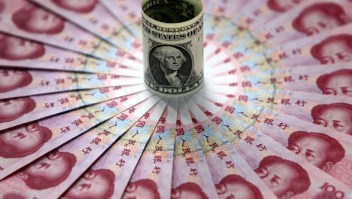 dolar caída inflación yuan