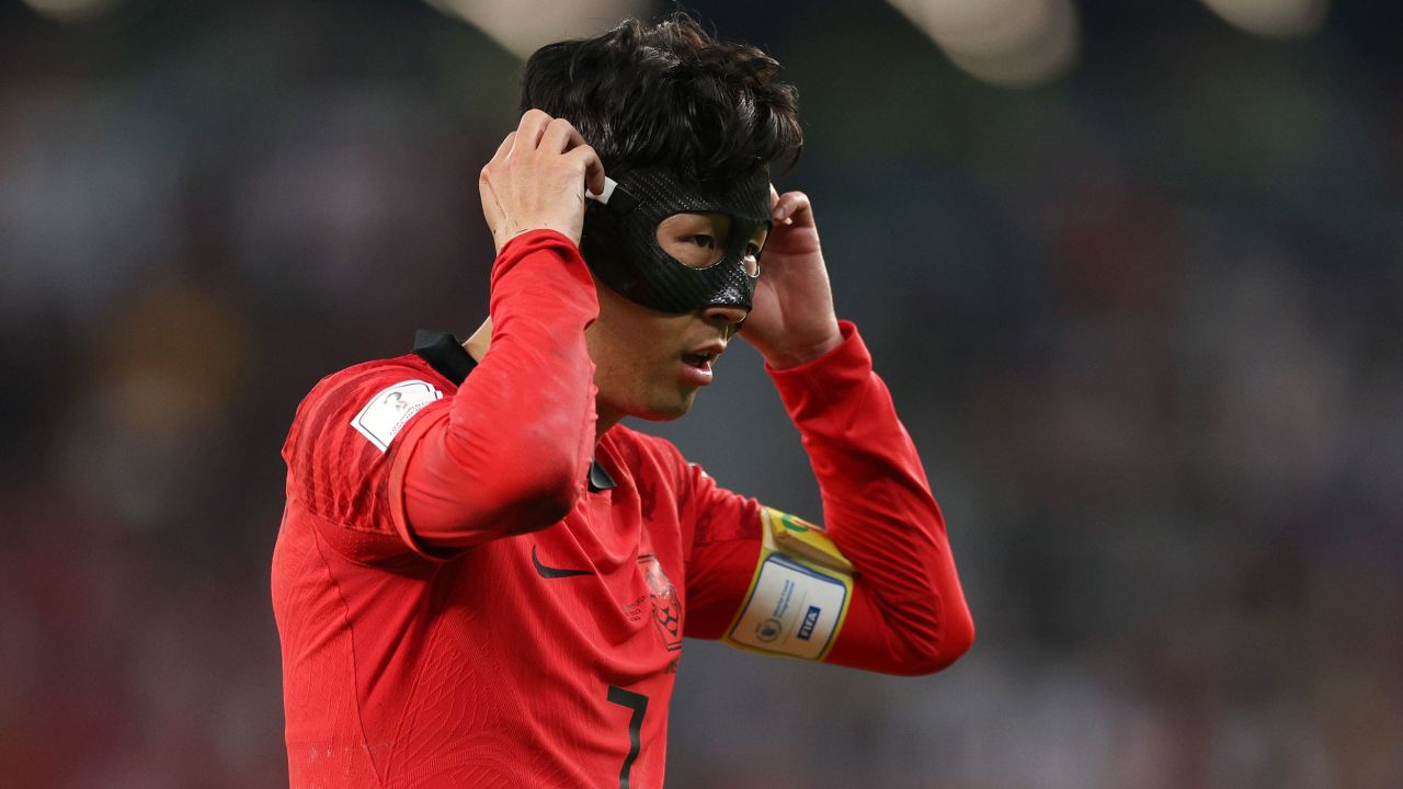 Why do some soccer players wear masks at the World Cup matches in Qatar?