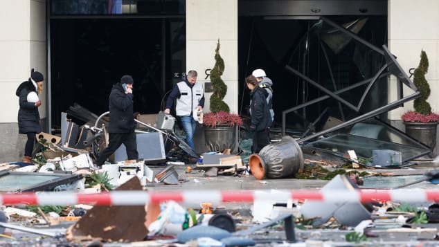 Emergency services go to the place where the AquaDom exploded, in Berlin. 