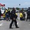 Las fuerzas de seguridad detienen a simpatizantes del expresidente Jair Bolsonaro tras retomar el control del Palacio Presidencial de Planalto, en Brasilia, el 8 de enero de 2023. (TON MOLINA/AFP via Getty Images)