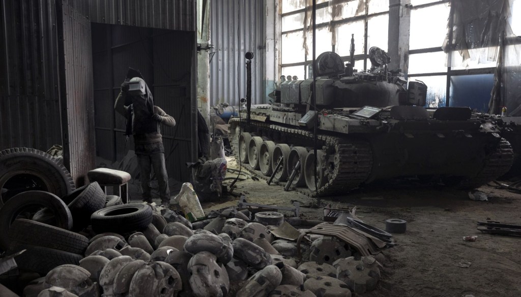 Ukrainians repair captured Russian tanks on the battlefield