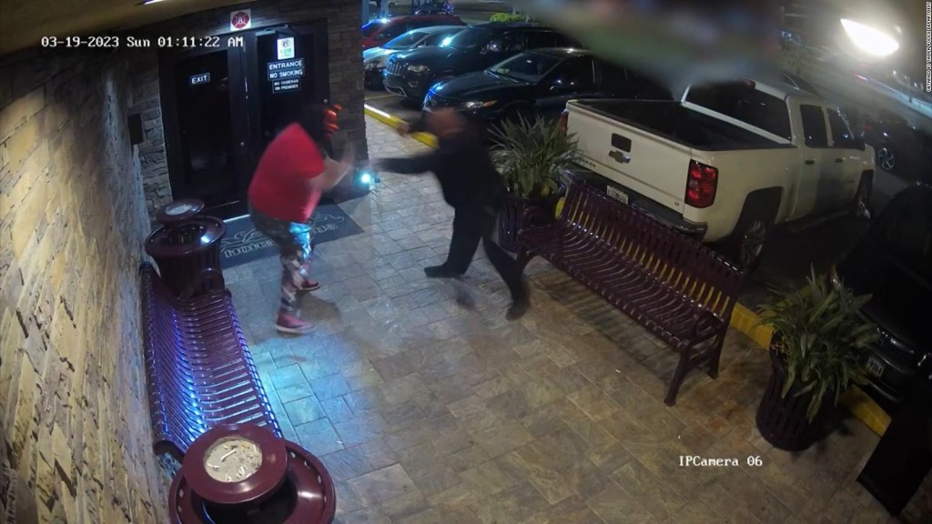 Watch the moment a gunman tries to break into a club