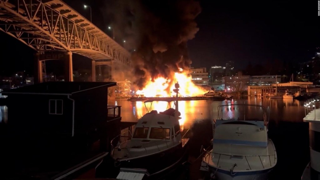 Fire in a marina destroys at least 30 boats