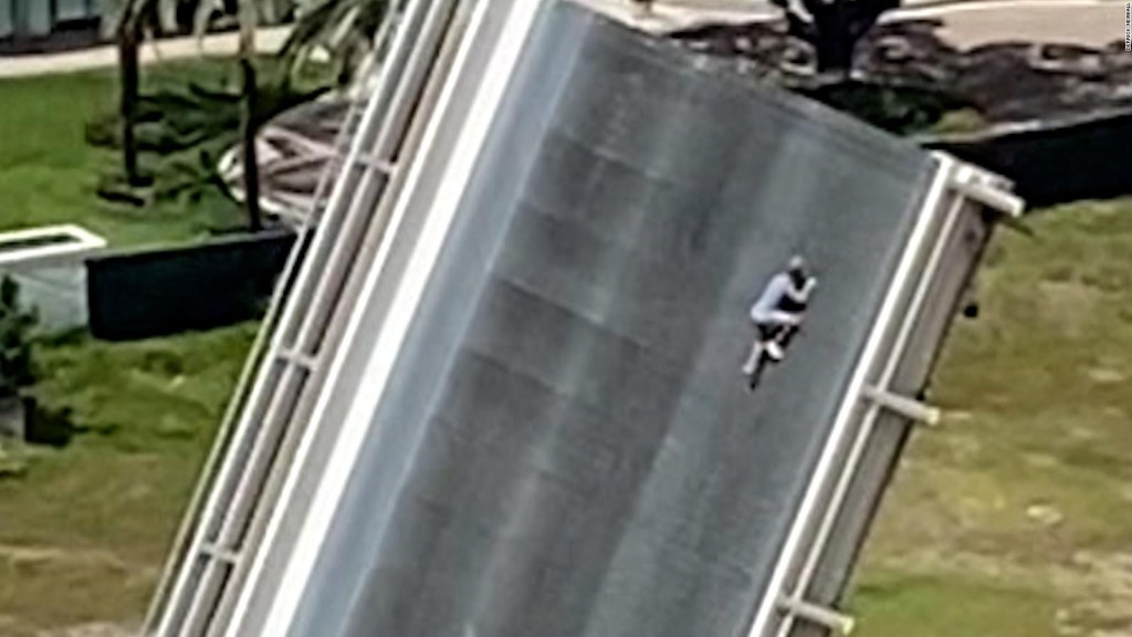 Mystery man scales Miami drawbridge