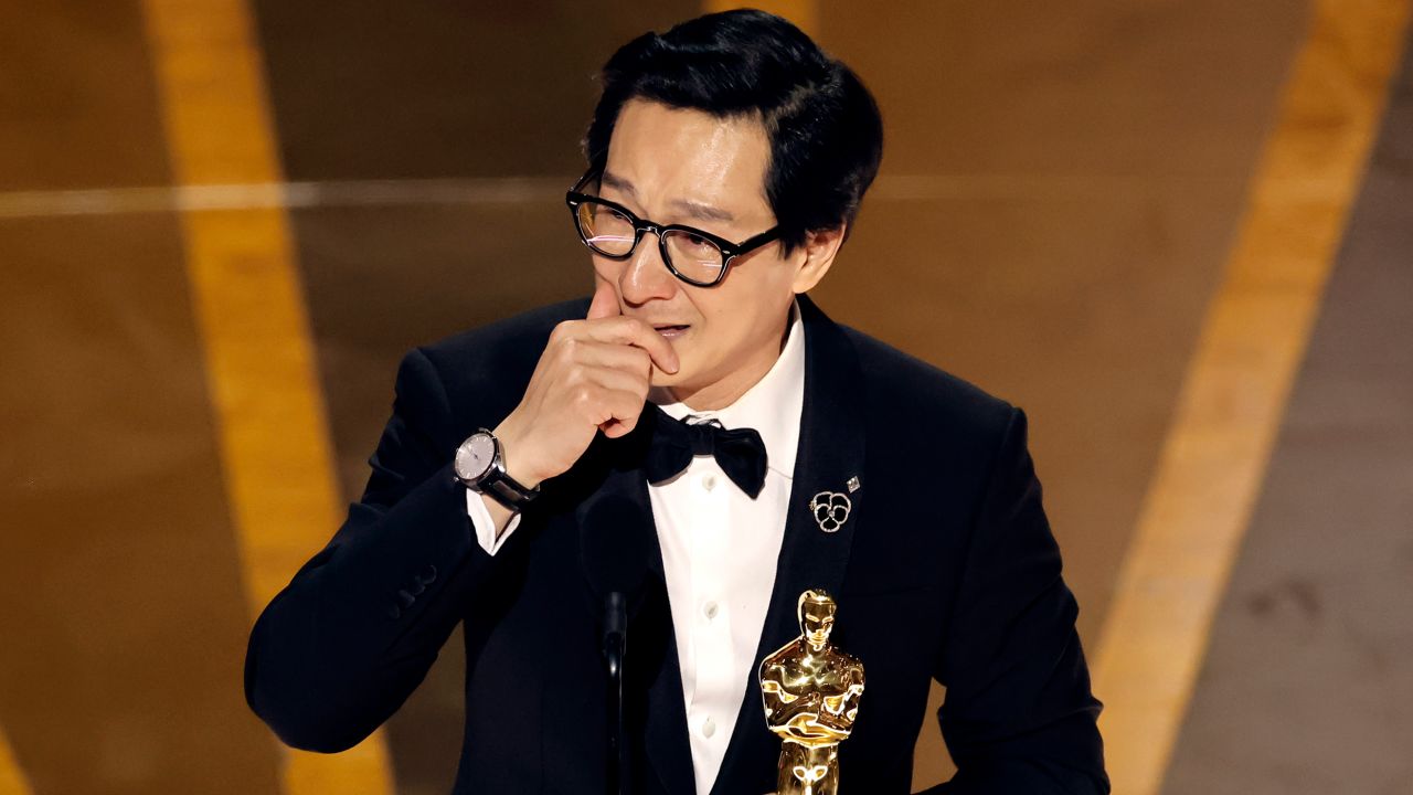 Ke Huy Quan receiving the Academy Award for Best Supporting Actor for his role in 'Everything Everywhere All at Once'. 