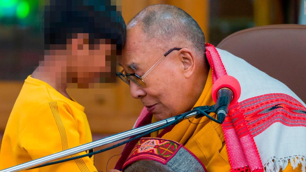 The Dalai Lama apologizes for kissing a boy on the mouth