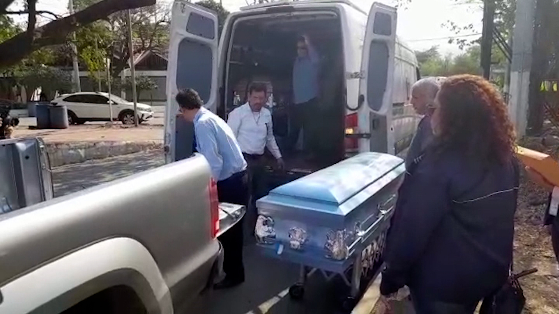 The bodies of 7 migrants who died in a fire in Mexico have arrived in El Salvador