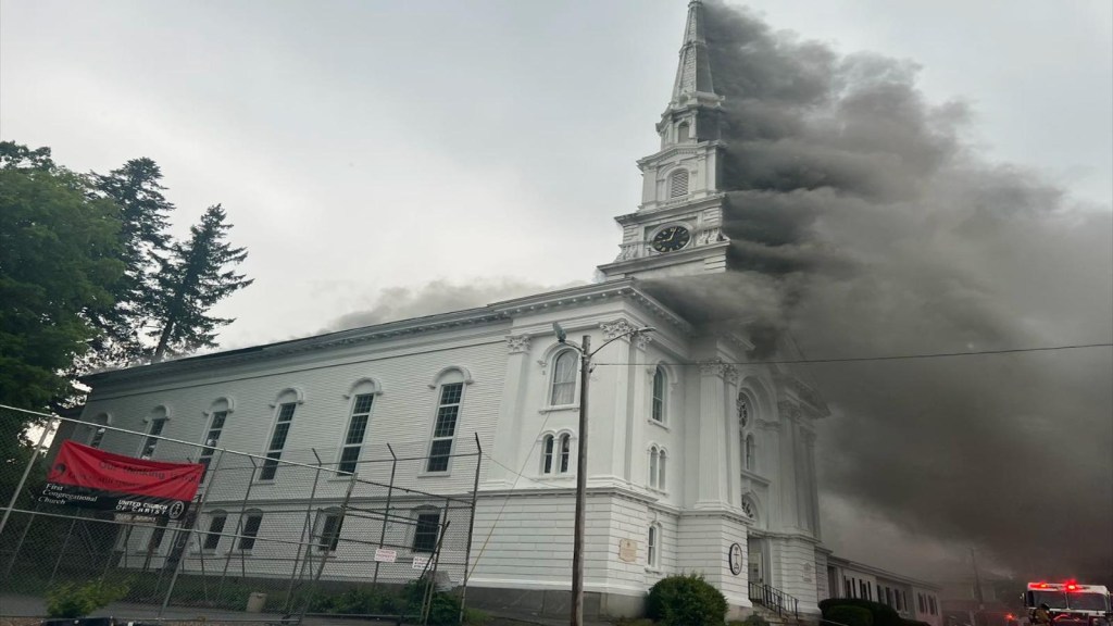 Watch the collapse of a historic bell tower after a fire
