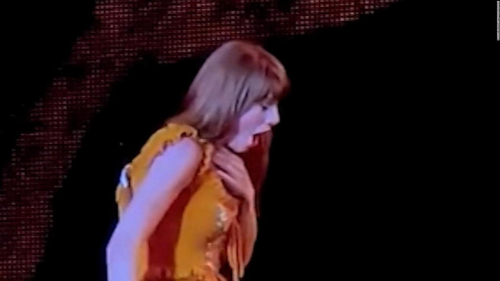 Taylor Swift chokes on a show.  look at his reaction