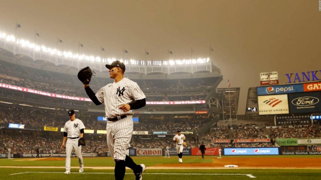 Smoke fills Yankee Stadium during a game