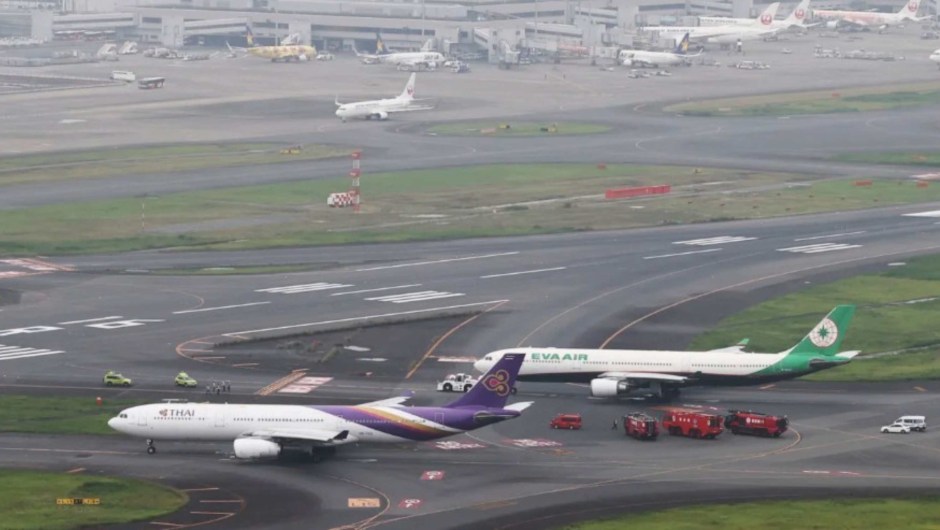 Thai Airways and Eva Air planes reportedly collided on the runway at Haneda International Airport in Tokyo on June 10, 2023. (Kenichi Matsuda/The Yomiuri Shimbun/AP)