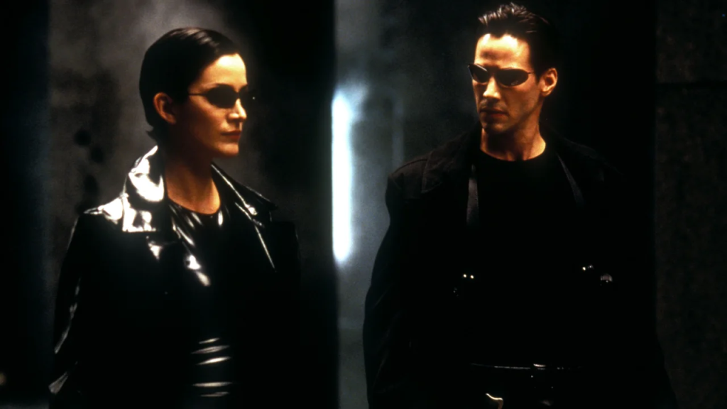 Carrie-Anne Moss y Keanu Reeves en "Matrix" (1999). (Crédito: Jasin Boland/Warner Bros/Village/Shutterstock)