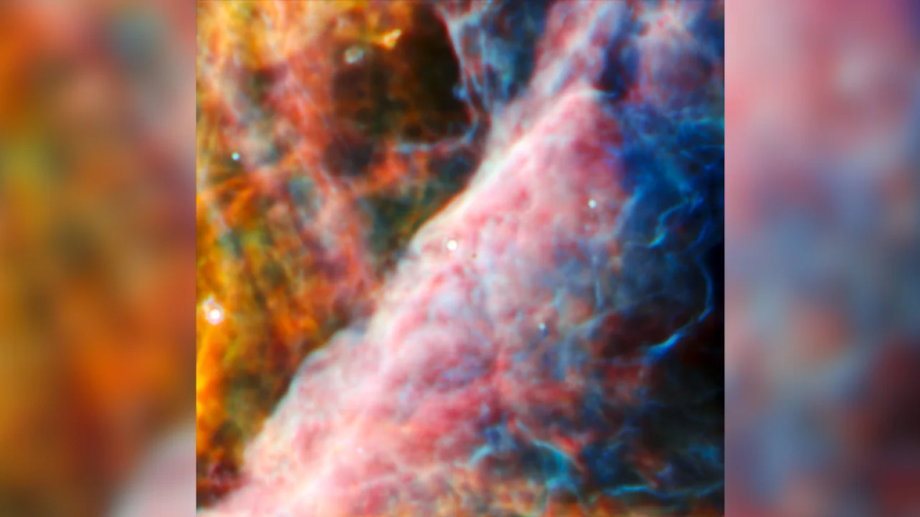 Esta imagen del instrumento infrarrojo medio del Webb muestra una pequeña región de la nebulosa de Orión. (Crédito: ESA/Webb/NASA/CSA)