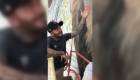 Beckham posed next to the Lionel Messi mural in Miami