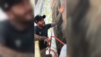 Beckham posó junto al mural de Lionel Messi en Miami