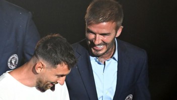 Argentine soccer star Lionel Messi (L) smiles next to former British football player and one of the owners of Inter Miami CF David Beckham as he is presented as the newest player for Major League Soccer's Inter Miami CF, at DRV PNK Stadium in Fort Lauderdale, Florida, on July 16, 2023. (Photo by CHANDAN KHANNA / AFP) (Photo by CHANDAN KHANNA/AFP via Getty Images)