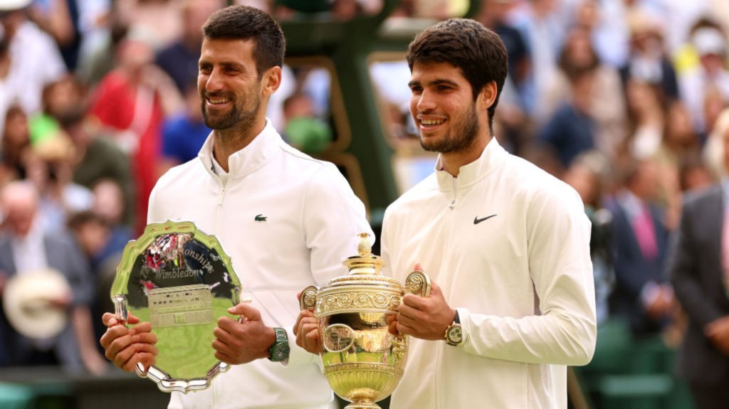 Novak Djokovic and Carlos Alcaraz with their second and first trophy respectively from Wimbledon 2023. (Photo: Clive Brunskill/Getty Images)