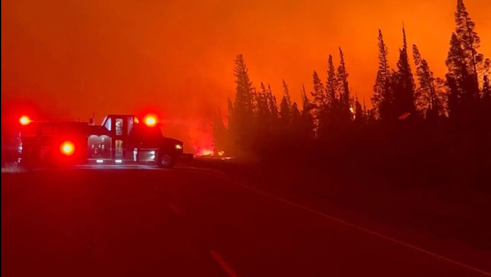 Hundreds of wildfires in Canada’s Northwest Territories prompt evacuations in what officials call a ‘crisis situation’