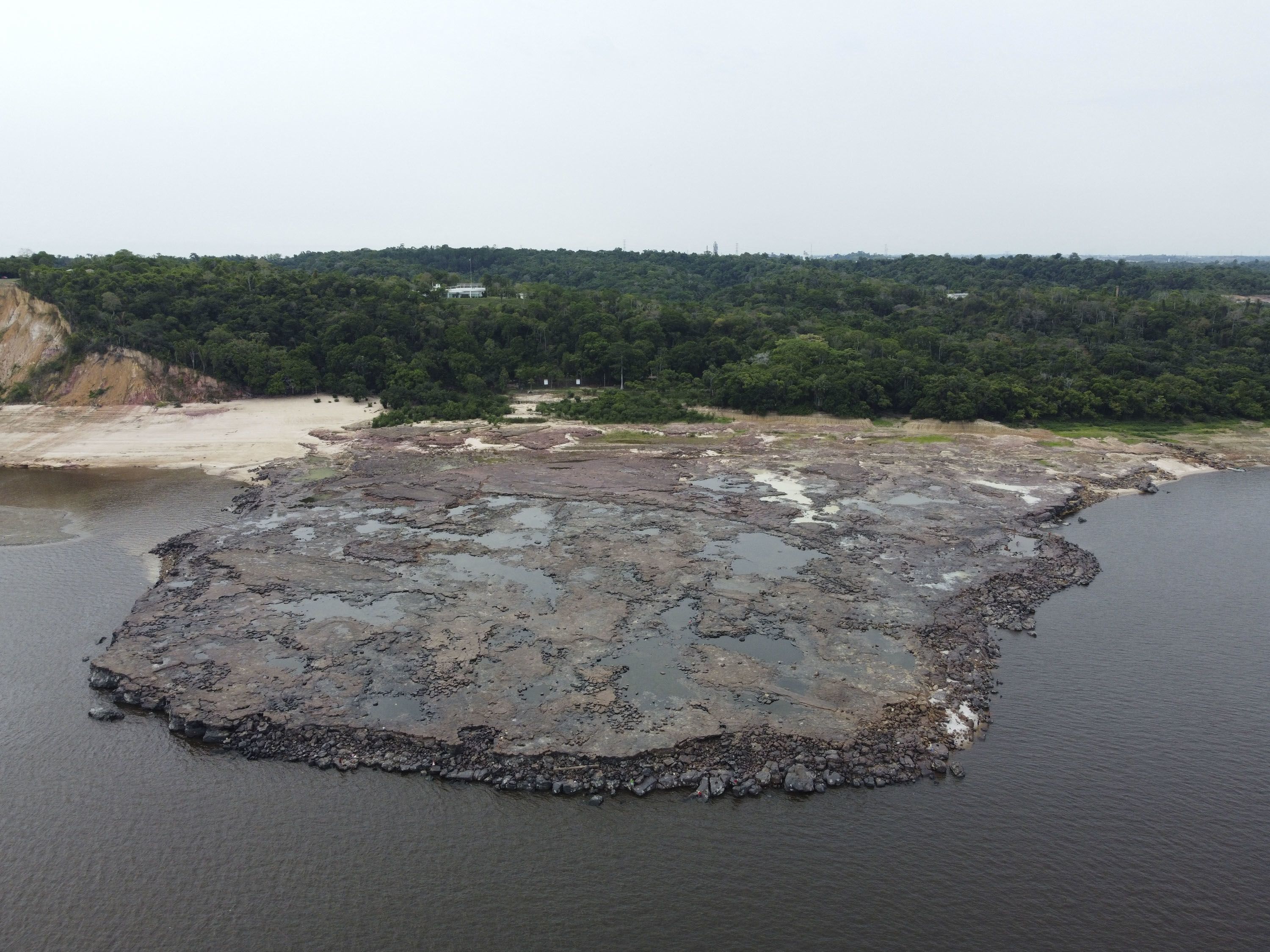 A rocky point where two rivers, the Rio Negro and the Solimos, meet.  (Swami Bedown/Reuters)