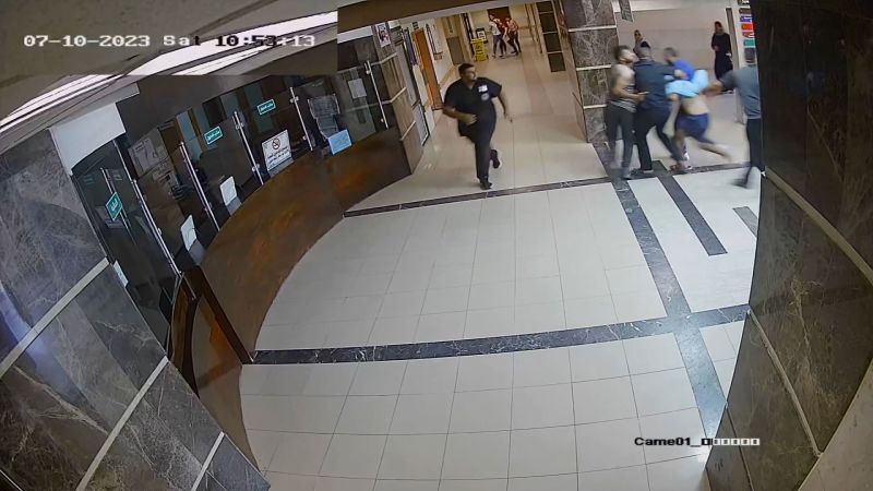 A still image from a video broadcast by CCTV and released by the Israeli military, which it says shows Hamas fighters carrying hostages to Shifa Hospital on October 7.  (Image source: Israel Defense Forces)