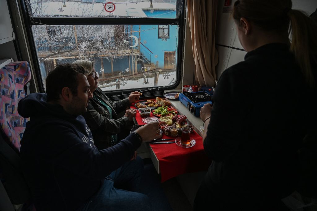 Passengers of the Dogu Express Train (Photo Credit: OZAN KOSE/AFP via Getty Images)